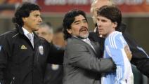 Argentina's coach Diego Maradona hugs Argentina's striker Lionel Messi after the 2010 World Cup quarter final Argentina vs Germany on July 3, 2010 at Green Point stadium in Cape Town. Germany won 4-0. NO PUSH TO MOBILE / MOBILE USE SOLELY WITHIN EDITORIAL ARTICLE - AFP PHOTO / JAVIER SORIANO (Photo credit should read JAVIER SORIANO/AFP via Getty Images)	