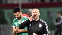 Algeria's player Riyad Mahrez (L) and head coach Djamel Belmadi gesture during the friendly football match between Algeria and DR Congo at Mustapha Tchaker stadium in the city of Blida on October 10, 2019. (Photo by RYAD KRAMDI / AFP) (Photo by RYAD KRAMDI/AFP via Getty Images)