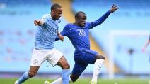Manchester City's English midfielder Raheem Sterling (L) vies with Chelsea's French midfielder N'Golo Kante (R) during the English Premier League football match between Manchester City and Chelsea at the Etihad Stadium in Manchester, north west England, on May 8, 2021. - RESTRICTED TO EDITORIAL USE. No use with unauthorized audio, video, data, fixture lists, club/league logos or 'live' services. Online in-match use limited to 120 images. An additional 40 images may be used in extra time. No video emulation.