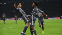 Bayern Munich's Kingsley Coman (R) celebrates with Bayern Munich's Thiago Alcantara (L) after scoring a goal during the UEFA Champions League Group E football match between AFC Ajax and FC Bayern Munchen at the Johan Cruyff Arena in Amsterdam on December 12, 2018 (Photo by JOHN THYS / AFP) (Photo credit should read JOHN THYS/AFP via Getty Images)