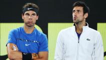 MELBOURNE, AUSTRALIA - JANUARY 10: Rafael Nadal of Spain (L) and Novak Djokovic of Serbia hits a forehand react after watching a video replay while on the sidelines during the Tie Break Tens ahead of the 2018 Australian Open at Margaret Court Arena on January 10, 2018 in Melbourne, Australia. (Photo by Michael Dodge/Getty Images)
