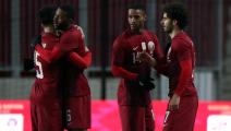 Qatar's players celebrate after the FIFA World Cup Qatar 2022 friendly preparation football match Qatar v Luxembourg in Debrecen, on March 24, 2021. (Photo by Peter Kohalmi / AFP) (Photo by PETER KOHALMI/AFP via Getty Images)