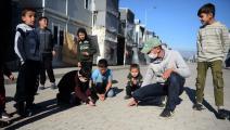 لاجئون سوريون في مساكن مؤقتة في تركيا (توناهان أقغون/ الأناضول)