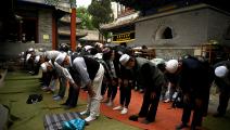 مسلمون يصلون في بكين (نويل سيليس/ فرانس برس)