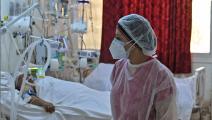 إجهاد كبير للعاملين الصحيين في تونس (فتحي بلعيد/ فرانس برس)