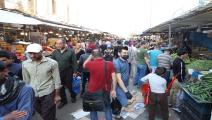 تزاحم في أسواق العراق (يونس كيليس/الأناضول)