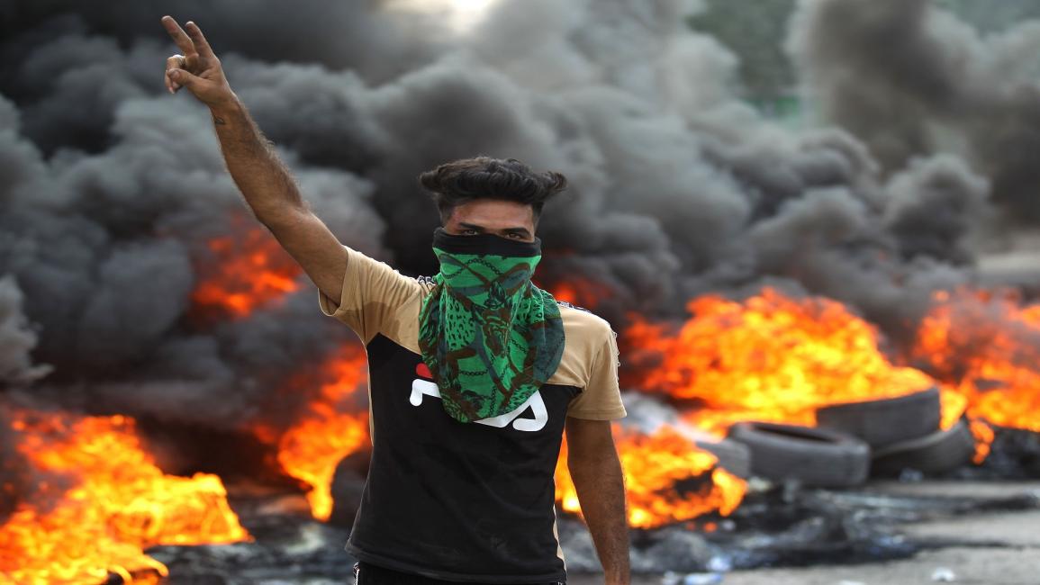 تظاهرات العراق (أحمد الربيعي/فرانس برس)