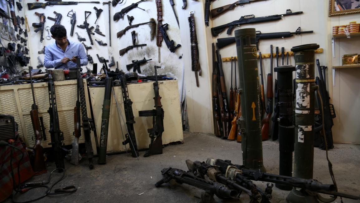 انتشار السلاح يقاوم سطوة القانون في العراق (سافين حامد/Getty)