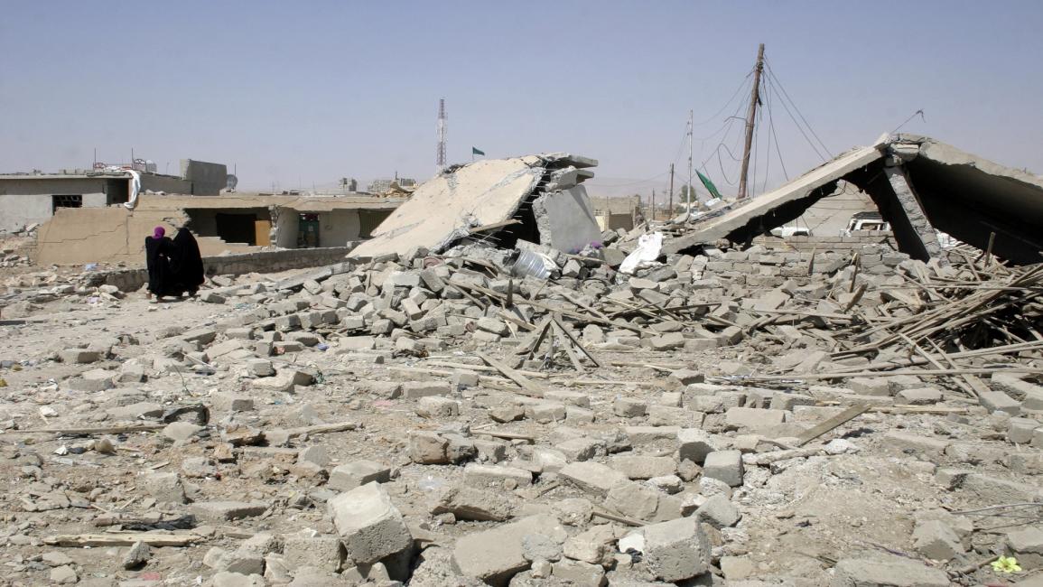 العراق-مجتمع- منازل مدمرة في الموصل (مجاهد محمد/فرانس برس)