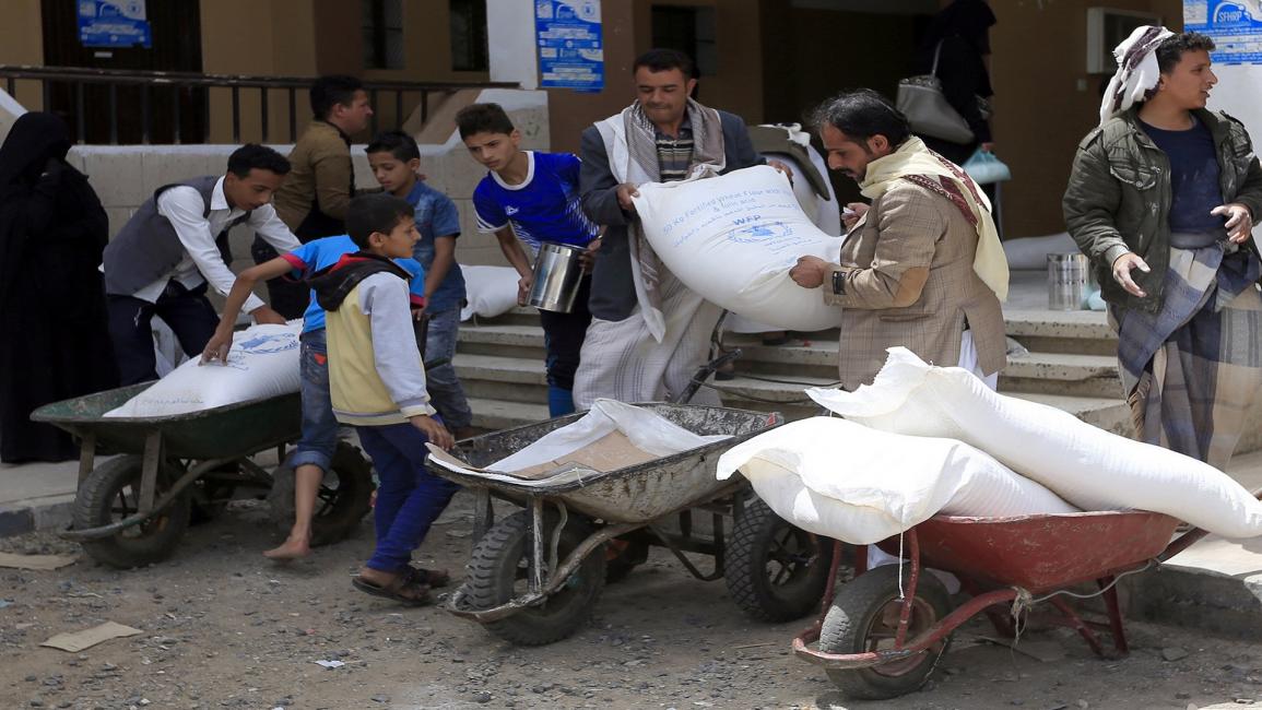 مساعدات برنامج الغذاء العالمي في اليمن (محمد حويس/فرانس برس)