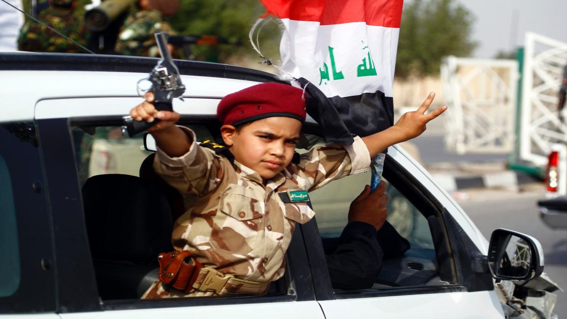طفل عراقي مسلح- فرانس برس