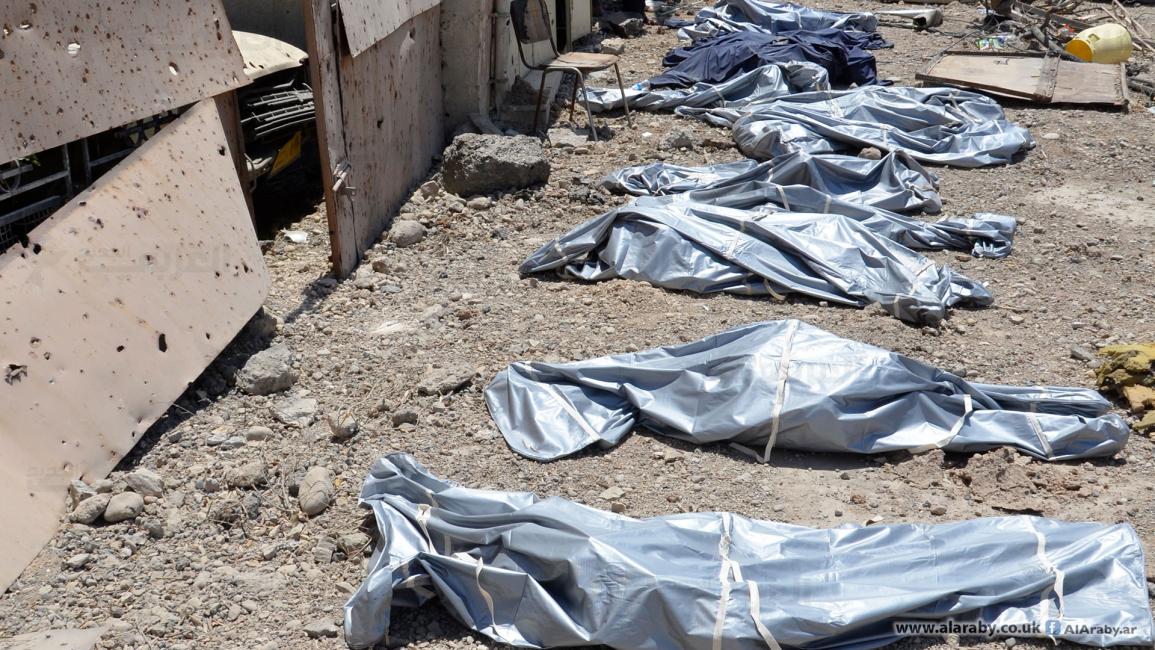 الدفاع المدني ينتشل جثثاً في الموصل(العربي الجديد)