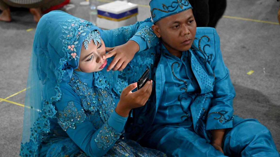 عروسان في جاكرتا - إندونيسيا - مجتمع