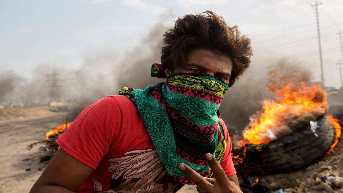 شاب عراقي مشارك في التظاهرات- فرانس برس