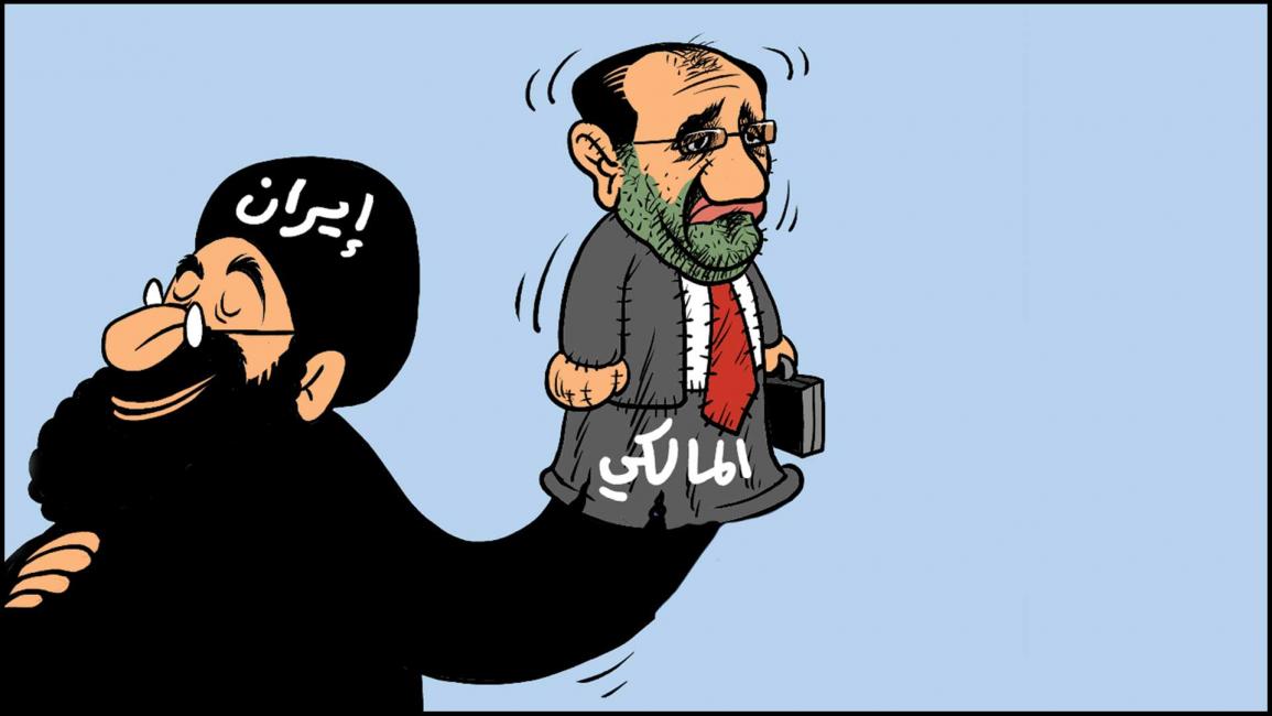 نوري المالكي / كاريكاتير - قسم المقالات