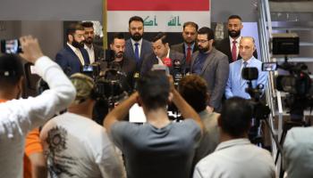 جماعة "رفض" العراقية تعقد مؤتمرا صحافيًا (القيادي في الجماعة حسام الحاج/ تويتر)