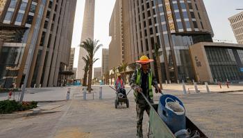 عمال بناء صينيون يعملون في العاصمة الإدارية بمصر/ فرانس برس