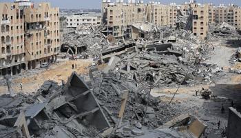 من آثار الإبادة الصهيونية في خانيونس جنوبي قطاع غزة، 14 آذار/مارس 2024 (Getty)