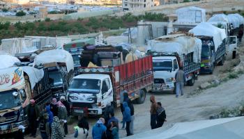 لاجئون سوريون يستعدون لمغادرة لبنان إلى سورية - 14 مايو 2024 (فرانس برس)