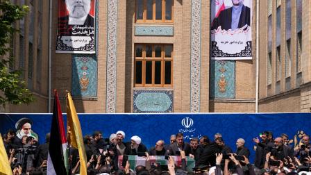 نعش الرئيس الإيراني ووزير الخارجية في طهران 23 مايو 2024 (Getty)
